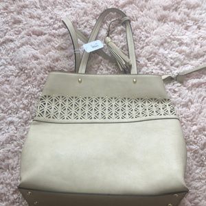 Charming Charlie cream purse